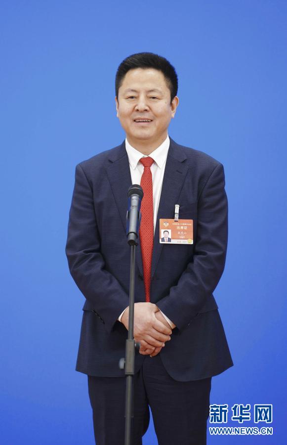 你的“命”，在我“心”上——兩次走上“委員通道”的敖虎山委員